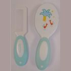 Brosse et peigne bleu