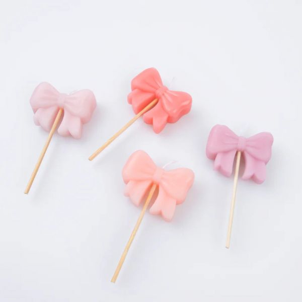 Lot de 4 bougies Noeuds roses