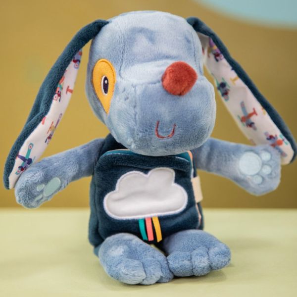 Peluche phosphorescente avec livre en tissu Jules