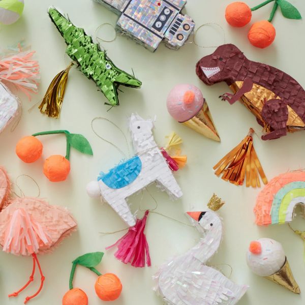 Mini piñata T-Rex avec confettis et tatouages