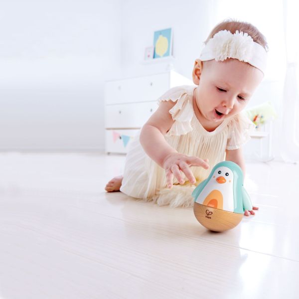 Pingouin culbuto turquoise en bois