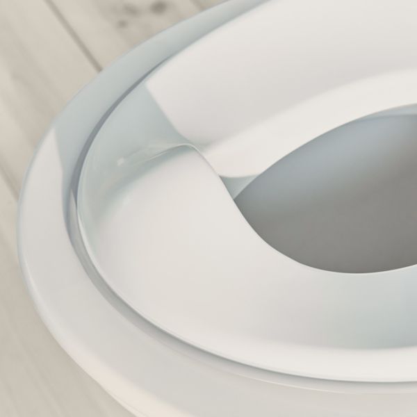 Réducteur de toilette blanc et gris
