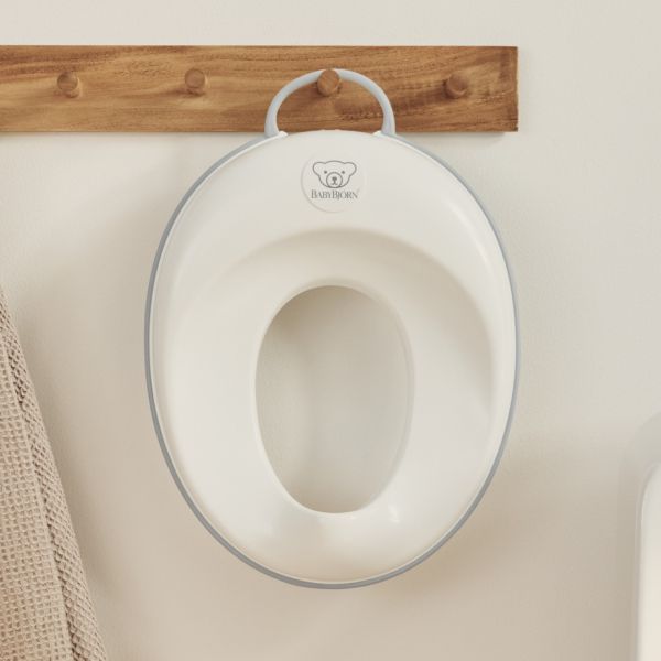 Réducteur de toilette blanc et gris