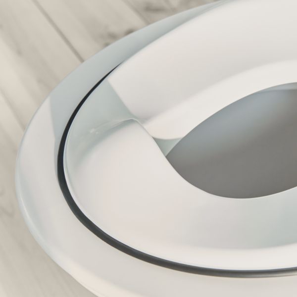 Réducteur de toilette blanc et noir
