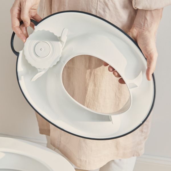 Réducteur de toilette blanc et noir